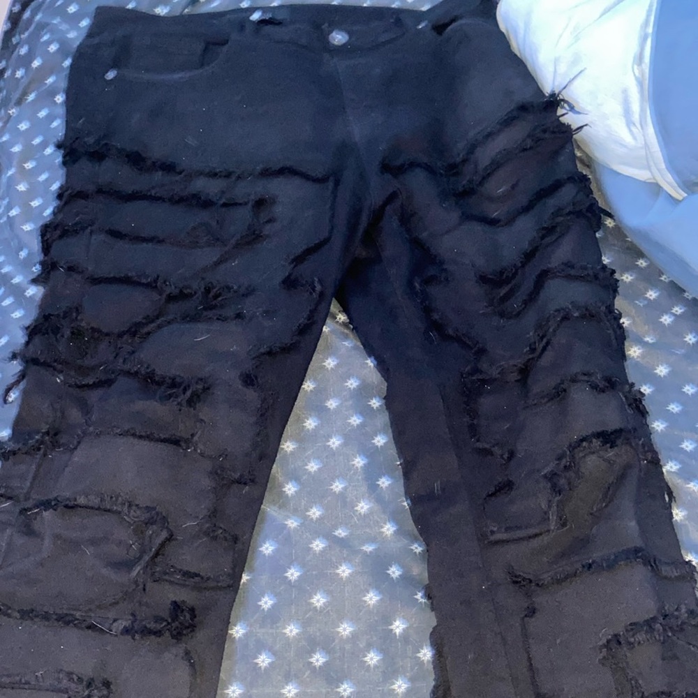 selling stacked pants black